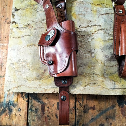 Leather Vertical Roto Shoulder Holster for Smith and Wesson with Dual Mag Pouch.